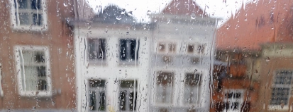 Huizen in regen – Gebouwenverzekering – Zakelijk