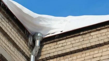 Dak vol met sneeuw – Gebouwenverzekering – Zakelijk