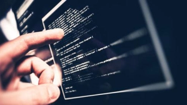 Code op scherm – Cybercrime verzekering – Zakelijk