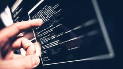 Code op scherm – Cybercrime verzekering – Zakelijk
