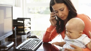 Vrouw met kind-stress-zakelijk