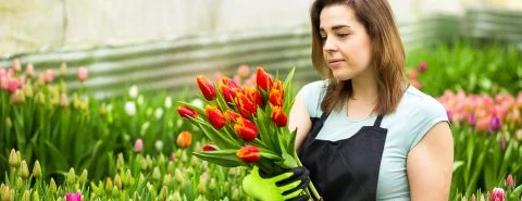 Vrouw met tulpen – Gebouwenverzekering – Zakelijk