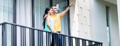Man en vrouw op balkon – Specialismen – Zakelijk