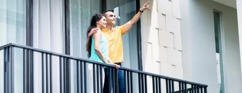 Man en vrouw op balkon – Specialismen – Zakelijk