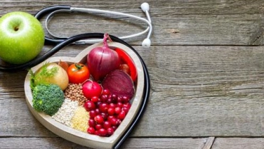 Hart met groente en fruit, stethoscoop – Ziekengeldverzekering – Zakelijk