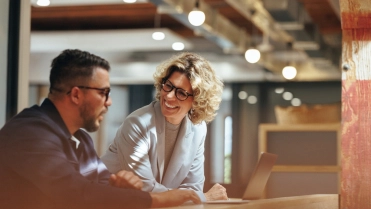 Successful,Business,People,Working,Together,In,A,Coworking,Office.,Two