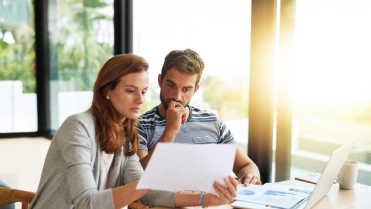 Couple,,Finance,And,Budget,Conversation,With,Documents,Planning,For,Tax,