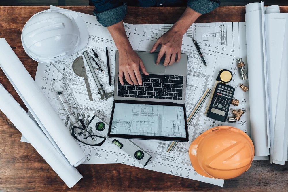 Engineering,Working,With,Drawings,Inspection,On,Laptop,In,The,Office