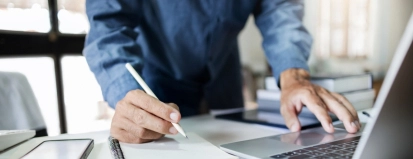 Close-up,Shot,,Asian,Businessman,Take,A,Note,And,Working,With
