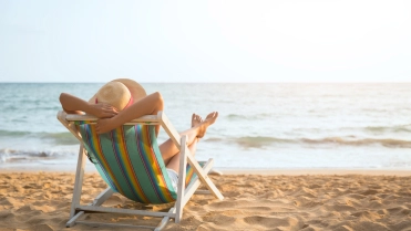 Woman on beach in summer