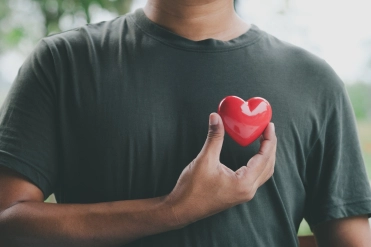 Hand holding red heart, World health day, Health care and mental health concept, Health insurance, Charity volunteer donation, CSR responsibility, World heart day, Self love
